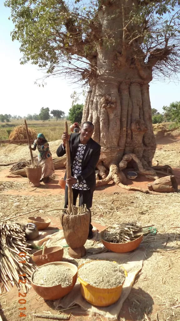 Gen. Coordinator in Danfili Village, Kalgo in Kebi State pounding Sussuka for the Villagers